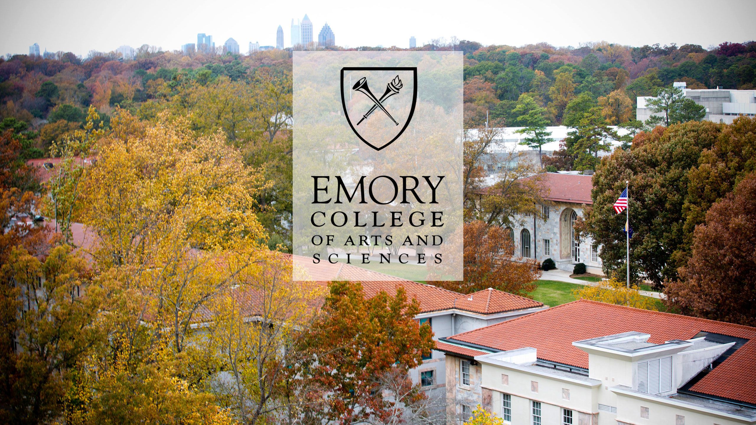 overhead view of the buildings on the quad in fall with Atlanta skyline in background and Emory College logo overlaid on photo.