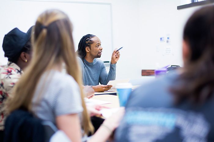 Nationally renowned poet Jericho Brown, director of creative writing, teaching a class