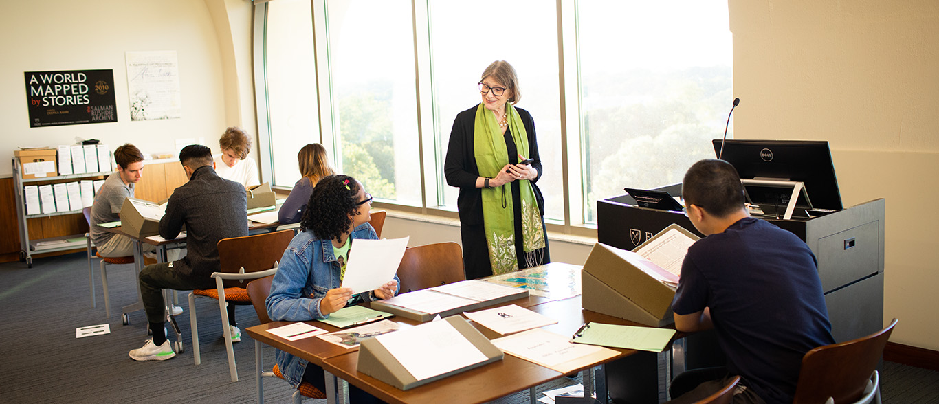 Professor Judith Miller teaching students in a classroom