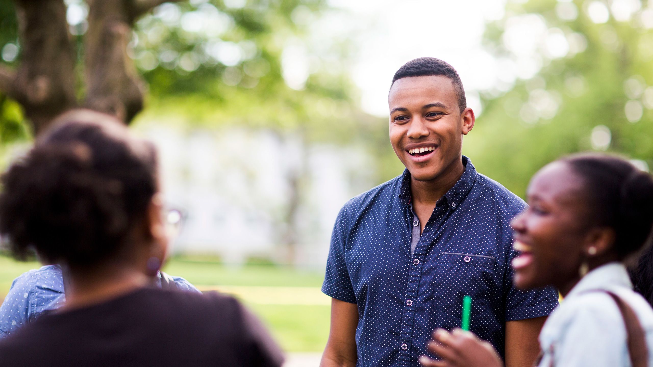 students talking on the quad