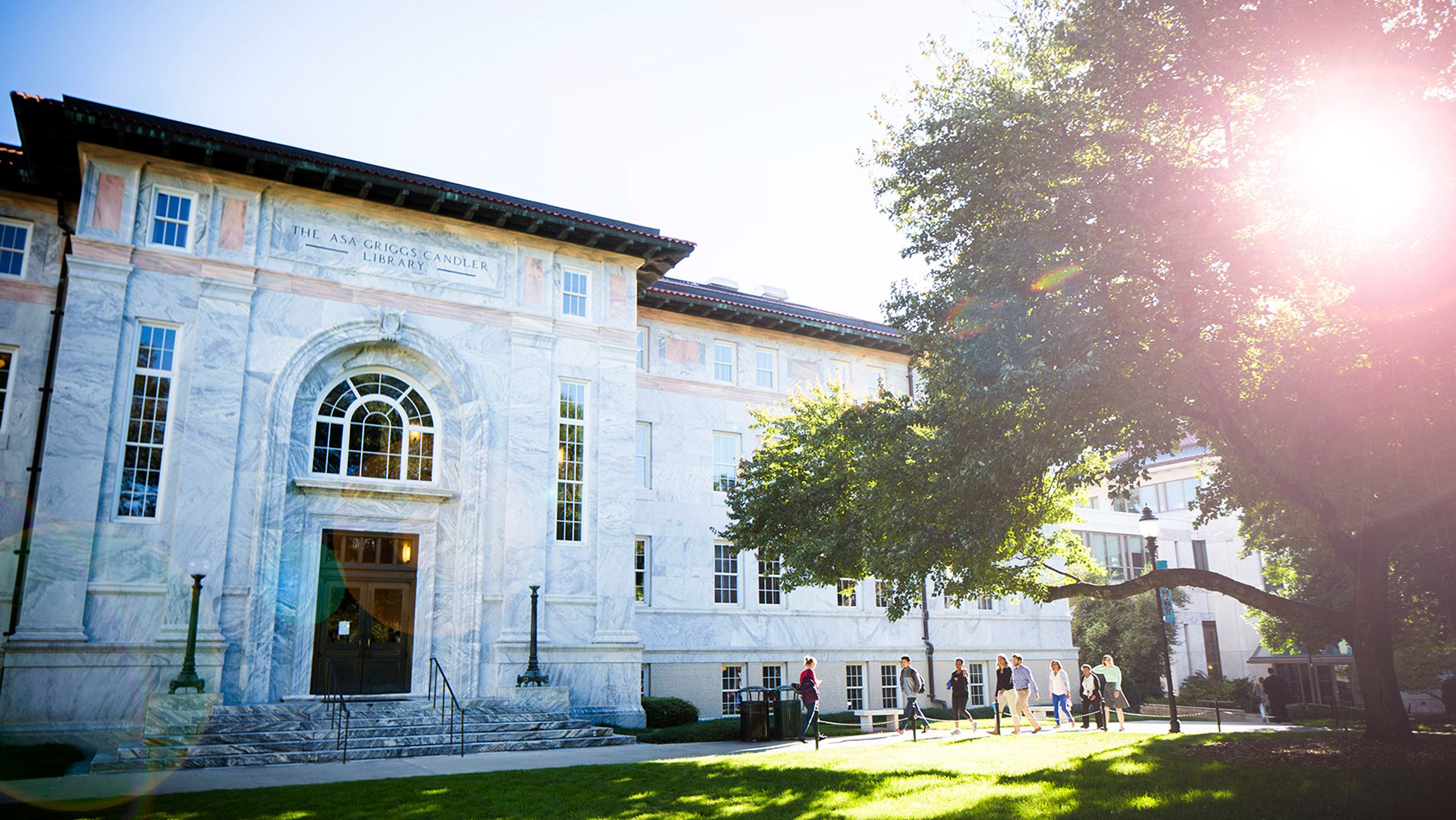 students walking in front of Candler Library